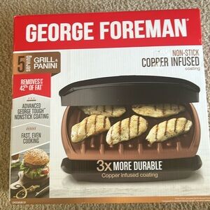 Brand new in box. George Foreman Grill. 5 serving size. Copper non stick